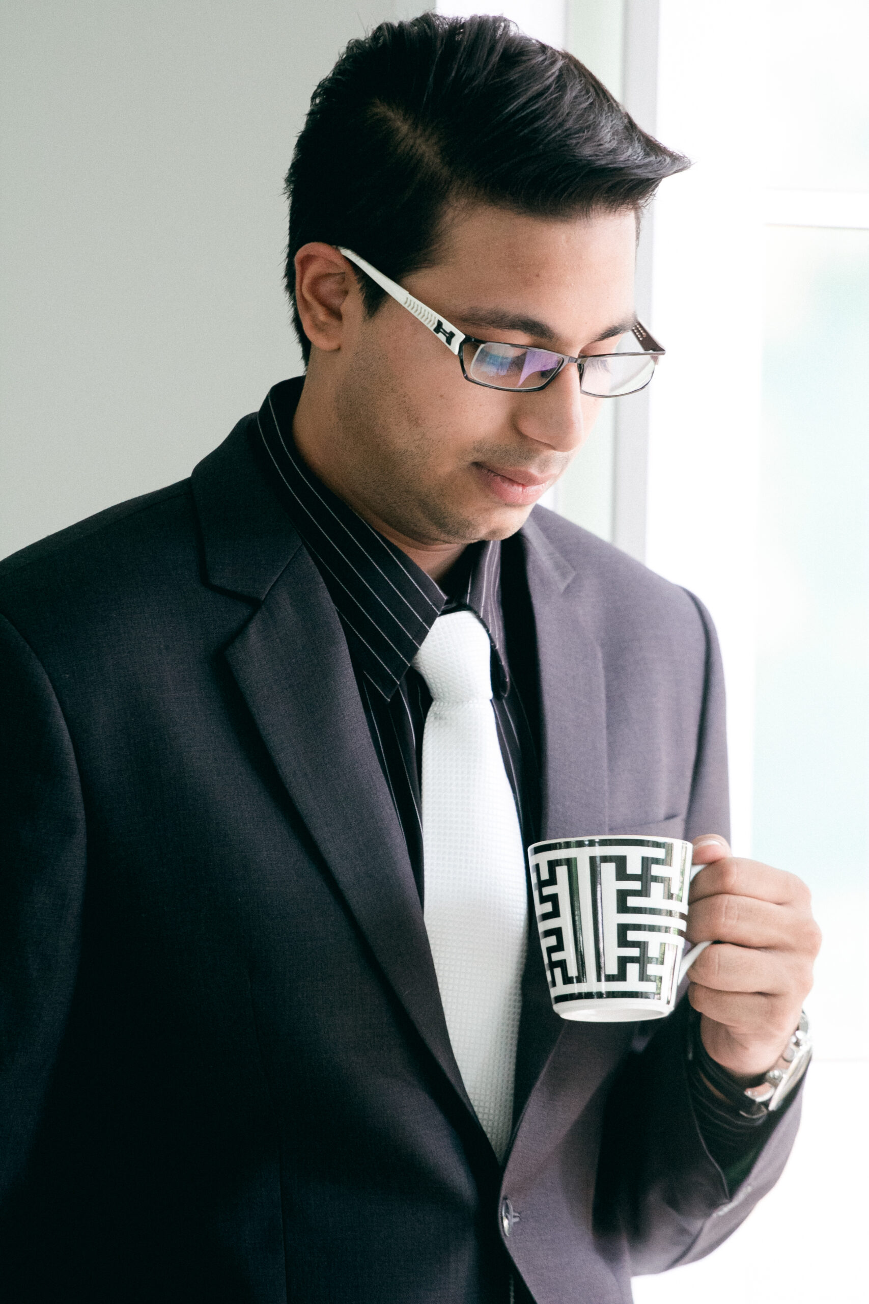 Charcoal Grey Three-piece suit with peak lapel — Vicky Collection bespoke suits Calgary